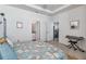Bedroom with access to bathroom and kitchen at 6922 Audobon Osprey Cv, Harmony, FL 34773