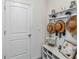 White entryway with bench and storage at 6922 Audobon Osprey Cv, Harmony, FL 34773