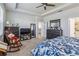 Bright main bedroom with a king-size bed and plenty of closet space at 6922 Audobon Osprey Cv, Harmony, FL 34773