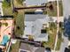 Aerial view showcasing a single-story house with a spacious lot at 8134 Hook Cir, Orlando, FL 32836