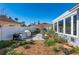 Landscaped backyard with grill station and patio at 8134 Hook Cir, Orlando, FL 32836