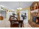 Open dining area with kitchen and living room views at 8134 Hook Cir, Orlando, FL 32836