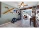 Home gym with elliptical machine and built-in bookshelves at 8134 Hook Cir, Orlando, FL 32836