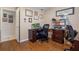 Spacious home office with wood floors and two desks at 8134 Hook Cir, Orlando, FL 32836