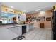 Modern kitchen with white cabinets and granite countertops at 8134 Hook Cir, Orlando, FL 32836