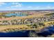 Community overview featuring a lake, homes, and roadway at 8729 Eden Cove Dr, Winter Garden, FL 34787