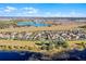 Aerial view of houses and lakefront community at 8729 Eden Cove Dr, Winter Garden, FL 34787