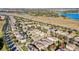 Aerial view of houses with solar panels at 8729 Eden Cove Dr, Winter Garden, FL 34787