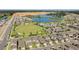 Overhead shot of the new construction community, including pond, tennis courts, pool, and green space at 8729 Eden Cove Dr, Winter Garden, FL 34787