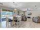 Bright dining room with table and chairs, adjacent to the kitchen and living areas at 8729 Eden Cove Dr, Winter Garden, FL 34787
