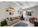 Home office with a couch, desk and theme decor at 8729 Eden Cove Dr, Winter Garden, FL 34787