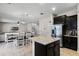 Modern kitchen with stainless steel appliances and granite island at 8729 Eden Cove Dr, Winter Garden, FL 34787