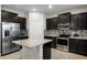 Modern kitchen with stainless steel appliances and granite countertops at 8729 Eden Cove Dr, Winter Garden, FL 34787