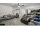 Open living room featuring a comfortable seating area and tile floors at 8729 Eden Cove Dr, Winter Garden, FL 34787