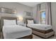 Bedroom with two twin beds and a view at 8774 Worldquest Blvd, Orlando, FL 32821