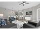 Spacious living room with open floor plan, and access to balcony at 8774 Worldquest Blvd, Orlando, FL 32821