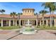 Community clubhouse with fountain and seating areas at 8801 Worldquest Blvd, Orlando, FL 32821