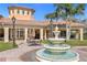 Community patio area with fountain and seating at 8801 Worldquest Blvd, Orlando, FL 32821