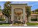 Elegant entrance to the community with landscaping at 8801 Worldquest Blvd, Orlando, FL 32821