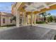 Covered entrance with brick pavers leading to the building at 8801 Worldquest Blvd, Orlando, FL 32821