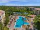 Resort-style pool with surrounding lounge chairs at 8801 Worldquest Blvd, Orlando, FL 32821