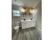 Double vanity bathroom with white cabinets and quartz countertops at 102 Colomba Rd, Debary, FL 32713