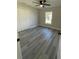 Spacious bedroom featuring a double door closet and ceiling fan at 102 Colomba Rd, Debary, FL 32713