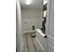 A well-lit laundry room with a utility sink and connections at 102 Colomba Rd, Debary, FL 32713