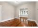 Hardwood floors and an open floor plan in this living room at 119 Leon Ave, Deland, FL 32720