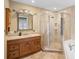 Bathroom boasts a large vanity, shower, and soaking tub at 1266 Juliana Pl, Orlando, FL 32807