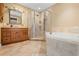 Relaxing bathroom with soaking tub and walk-in shower at 1266 Juliana Pl, Orlando, FL 32807