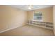 Spacious bedroom with built-in shelving and ceiling fan at 1266 Juliana Pl, Orlando, FL 32807