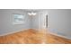 Bright dining room features hardwood floors and a chandelier at 1266 Juliana Pl, Orlando, FL 32807