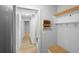 Hallway with built-in bench, hooks, and barn door at 1266 Juliana Pl, Orlando, FL 32807