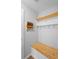 Hallway with built-in bench, hooks and barn door to laundry at 1266 Juliana Pl, Orlando, FL 32807