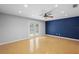 Bright living room featuring cork flooring and sliding glass doors at 1266 Juliana Pl, Orlando, FL 32807