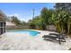 Relaxing pool area with lounge chairs and patio at 1266 Juliana Pl, Orlando, FL 32807