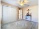 Bedroom with double door closet and blue patterned rug at 1318 Lucky Pennie Way, Apopka, FL 32712