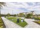 Fun outdoor game area with lush green space, ideal for Gathering gatherings and friendly competitions at 1443 Ridgeback Ln, Apopka, FL 32703