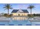 Exterior view of the community pool and clubhouse at 1443 Ridgeback Ln, Apopka, FL 32703