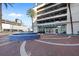 Elegant building entrance with fountain and brick pavers at 150 E Robinson St # 14A, Orlando, FL 32801