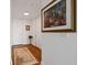 Elegant entryway with hardwood floors and artwork at 150 E Robinson St # 14A, Orlando, FL 32801