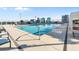 Refreshing rooftop pool with city views and lounge chairs at 150 E Robinson St # 14A, Orlando, FL 32801