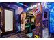 Game room featuring The Walking Dead arcade game at 16205 Saint Kitts Cir, Clermont, FL 34714