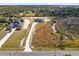 Aerial view of two homes with a large lot and surrounding landscape at 20316 Sheldon St, Orlando, FL 32833