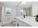 Clean bathroom with white vanity, bathtub, and shower at 20316 Sheldon St, Orlando, FL 32833