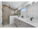 Modern bathroom with double vanity and walk-in shower at 20316 Sheldon St, Orlando, FL 32833