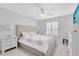 Bedroom with queen bed, white dresser, and window with shutters at 20316 Sheldon St, Orlando, FL 32833