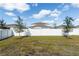 Private backyard with a white fence at 2037 Freemark St, Osteen, FL 32764