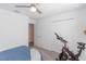 Bedroom with exercise bike and access to other rooms at 2037 Freemark St, Osteen, FL 32764